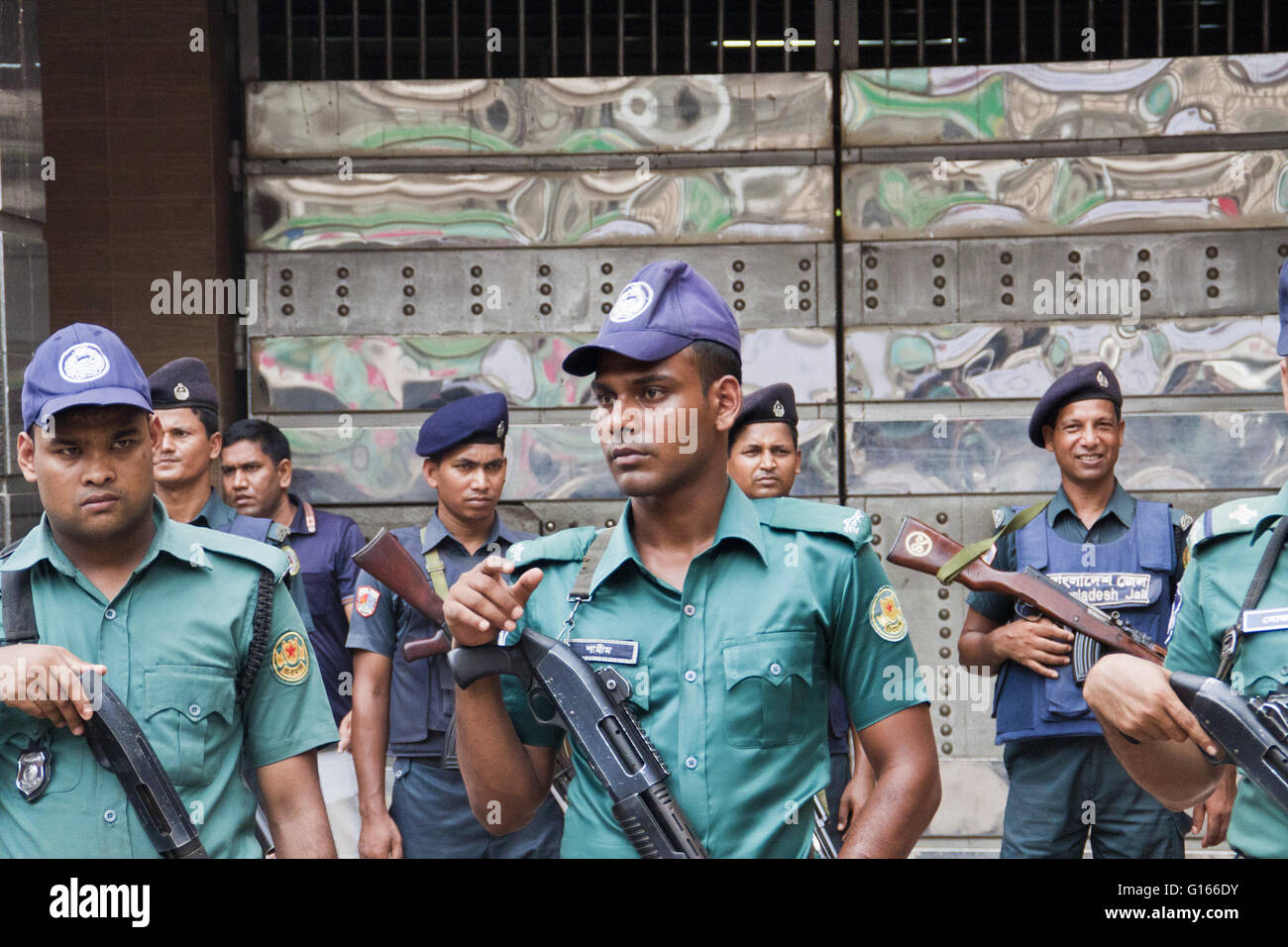 Dhaka. 10th May, 2016. Bangladeshi policemen stand guard in front of