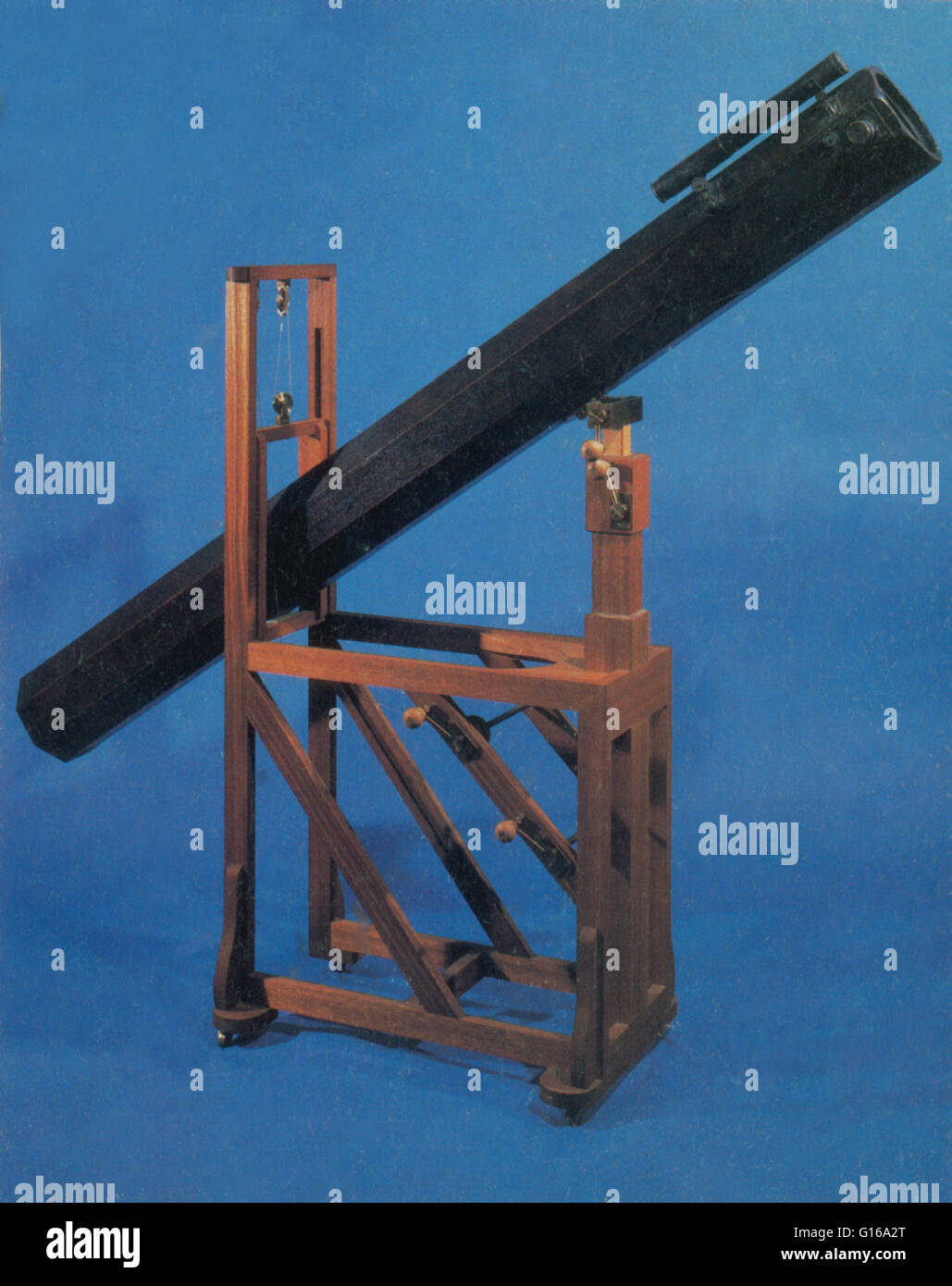 Replica of a telescope with a focal length of seven feet similar to that with which Herschel discovered Uranus. The telescope is suitable for a single observer. The telescope was aimed at the object with the help of the leading binoculars; in watching the Stock Photo