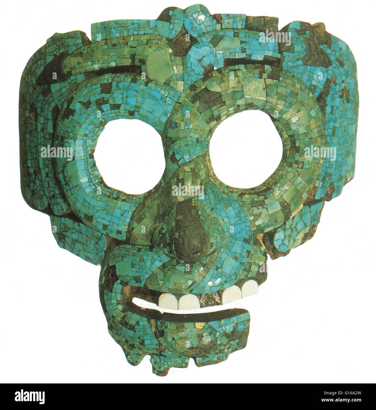 Turquoise mosaic mask of Quetzalcoatl, the feathered serpent. Quetzalcoatl is a Mesoamerican deity whose name comes from the Nahuatl language and has the meaning of 'feathered serpent'. Quetzalcoatl was related to gods of the wind, of Venus, of the dawn, Stock Photo