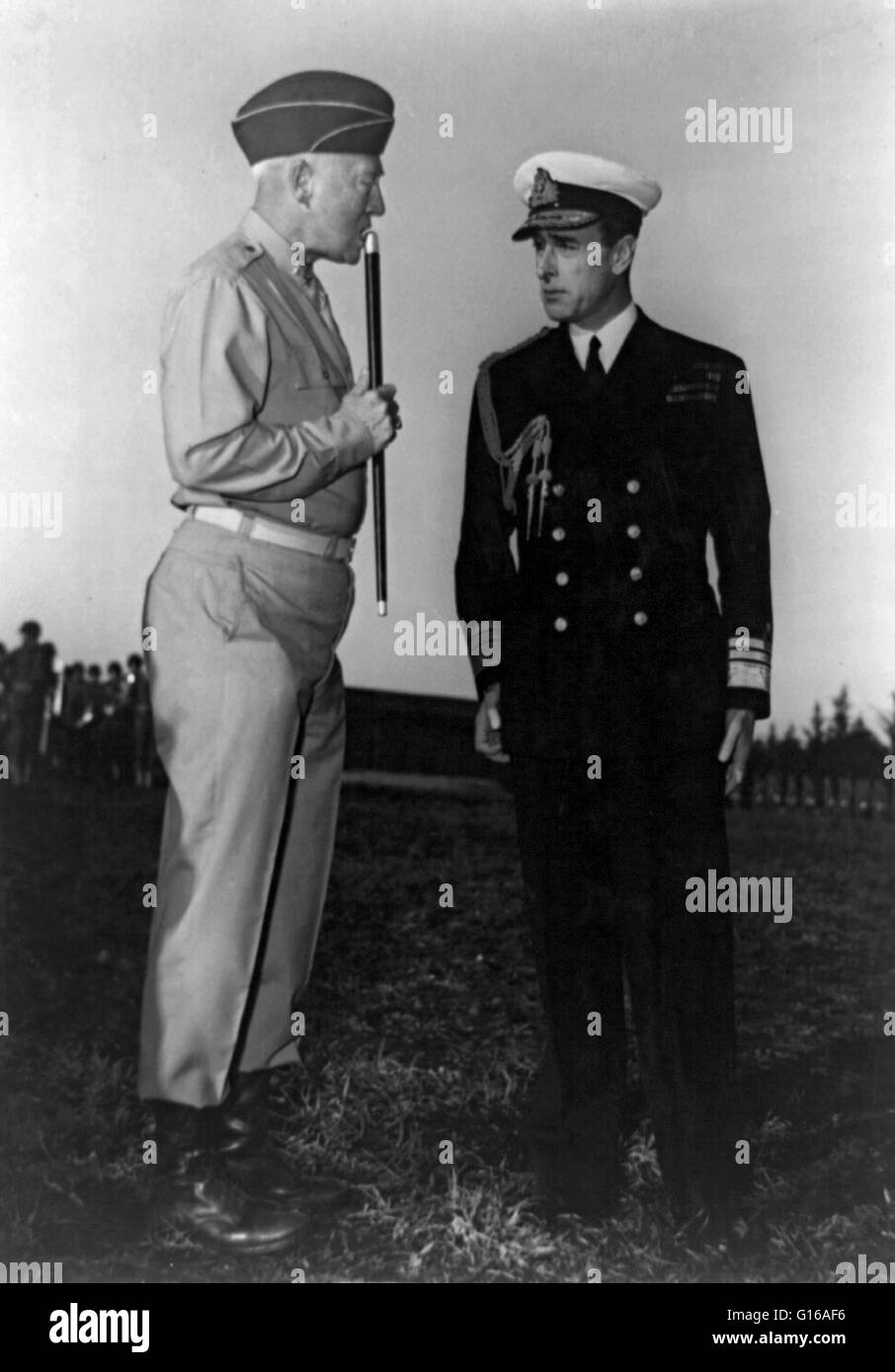 Major General Patton, Commander of US Forces in French Morocco, compares notes at Camp Anfa, near Casablanca, with Vice Admiral Mountbatten of Great Britain, Chief of Combined Operations. Photo was taken on the field the day President Roosevelt reviewed A Stock Photo