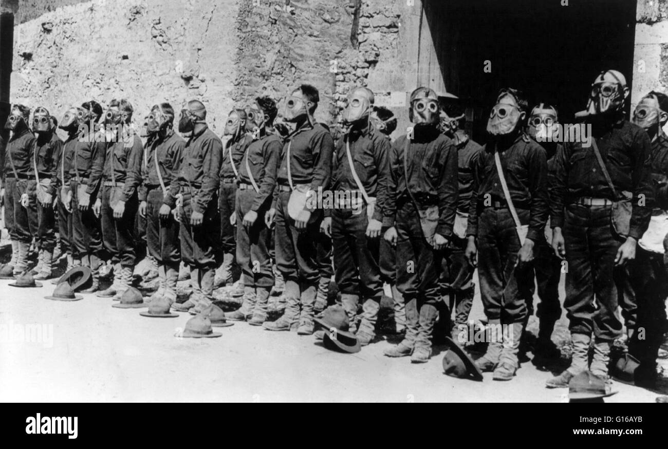 U.S. Marines standing in ranks with gas masks attached. France, 1918. The first use of poison gas on the Western Front was on April 22, 1915, by the Germans at Ypres, against Canadian and French colonial troops. The British Royal Society of Chemistry clai Stock Photo