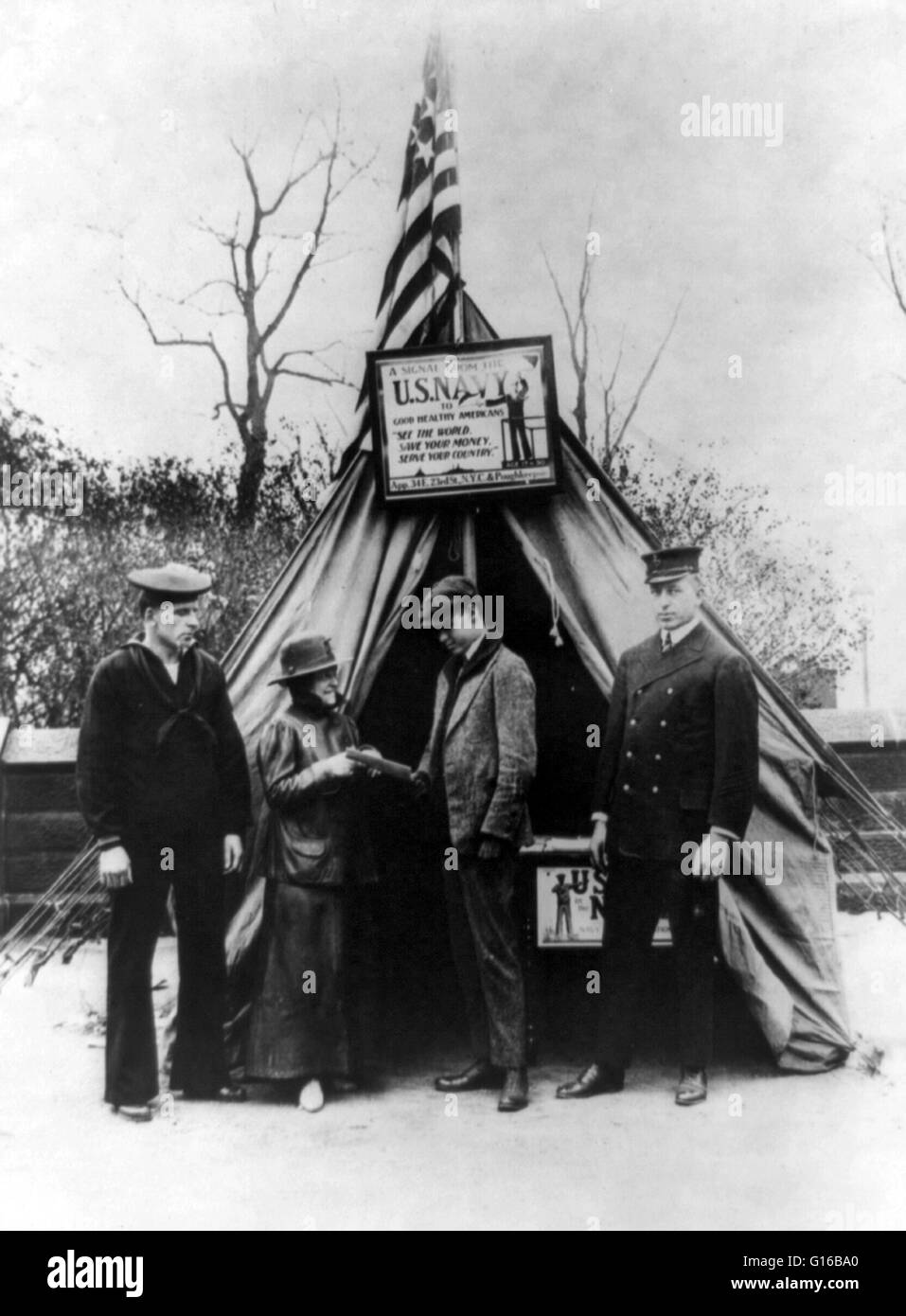 Mrs. Fannie Hunt Denie with her aides, a petty officer and a Jacky, and prospect in front of tent used as a naval recruiting office at the entrance to Central Park, N.Y. Central News Photo Service, photographer, April 14, 1917. Prior to the outbreak of Wo Stock Photo
