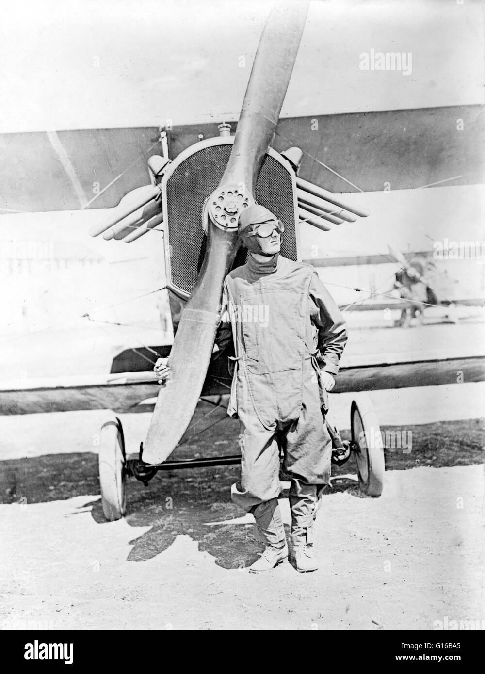 Unidentified pilot standing in front of U.S. Army airplane during World War I, 1918. The Air Service, United States Army, was a forerunner of the United States Air Force during and after World War I. In France, the Air Service of the American Expeditionar Stock Photo