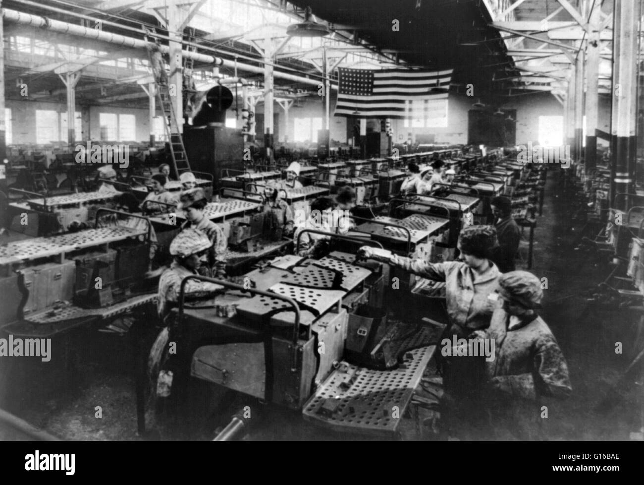 Entitled: Artillery vehicles - Camouflaging Department, American Car & Foundry Company, Detroit, Michigan. Showing women employees in ordnance plant during the first World War. U.S. Army Signal Corps photo circa 1914/18. During WWI, women started working Stock Photo