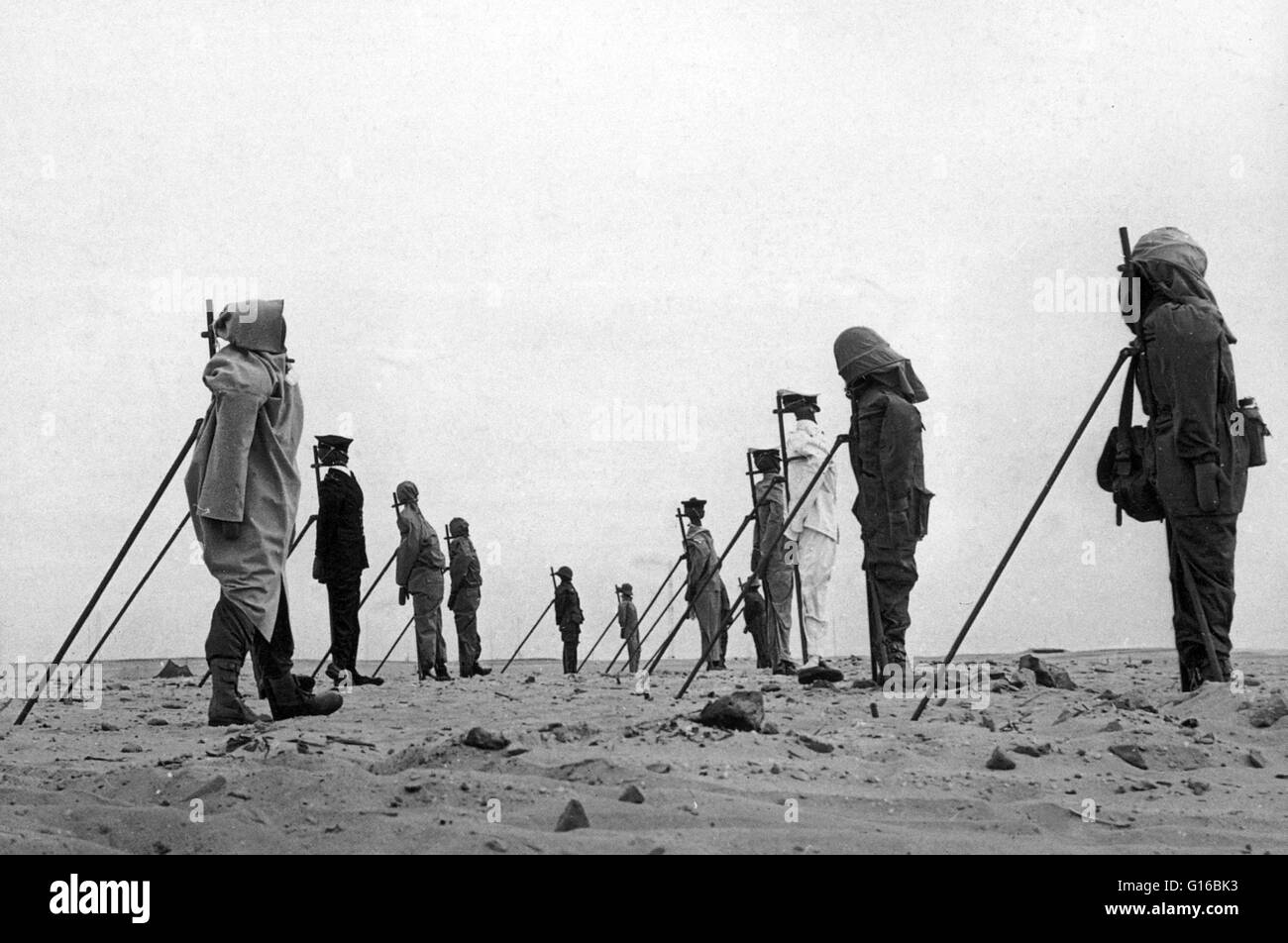 Caption: 'A set of dummies propped up in the Sahara Desert awaiting an atomic bomb explosion during the French nuclear testing, 1960.' The French Reggane nuclear test series was a group of 4 nuclear tests conducted in 1960-1961 during the Algerian War. Ge Stock Photo