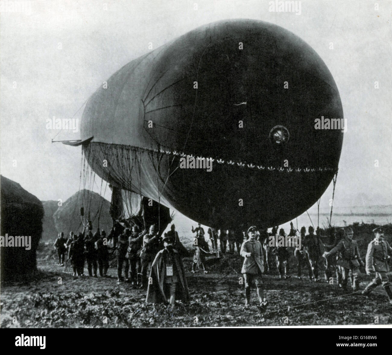 Observation balloons are balloons that are employed as aerial platforms for intelligence gathering and artillery spotting. During WWI both the Allies and Germany employed balloons, generally a few miles behind the front lines. Positioning artillery observ Stock Photo
