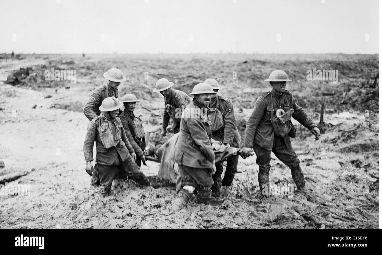 It took a stretcher party of seven to carry a wounded soldier from the muddy battlefield, August 1917. The Battle of Pilckem Ridge, July 31 - August 2, 1917, was the opening attack of the main part of the Battle of Passchendaele in WWI. The Allied attack Stock Photo