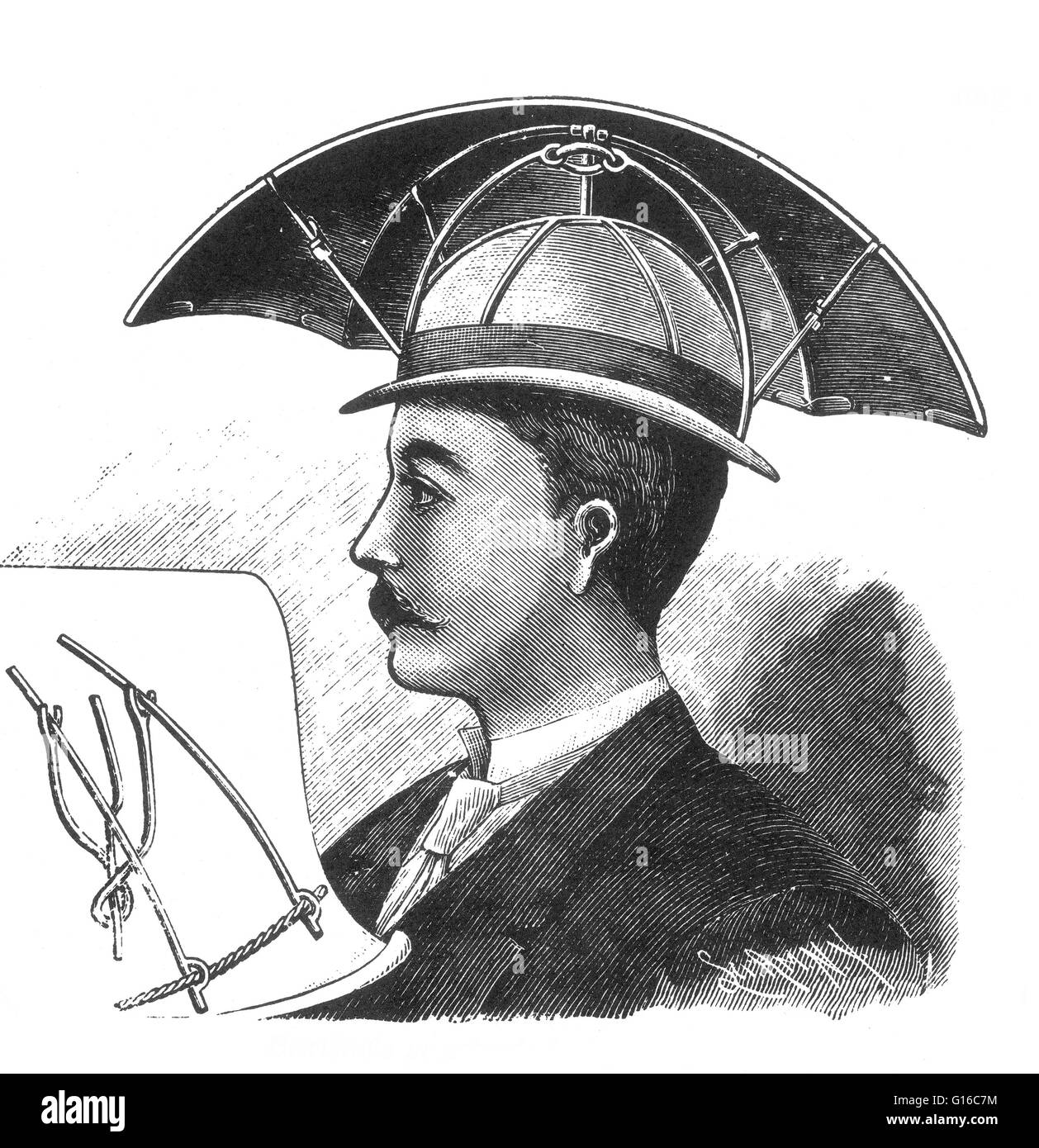 A simple umbrella designed to be worn over a hat and provide shade from the sun. An umbrella is a light, small, portable, usually circular cover for protection from rain or sun, consisting of a fabric held on a collapsible frame of thin ribs radiating fro Stock Photo