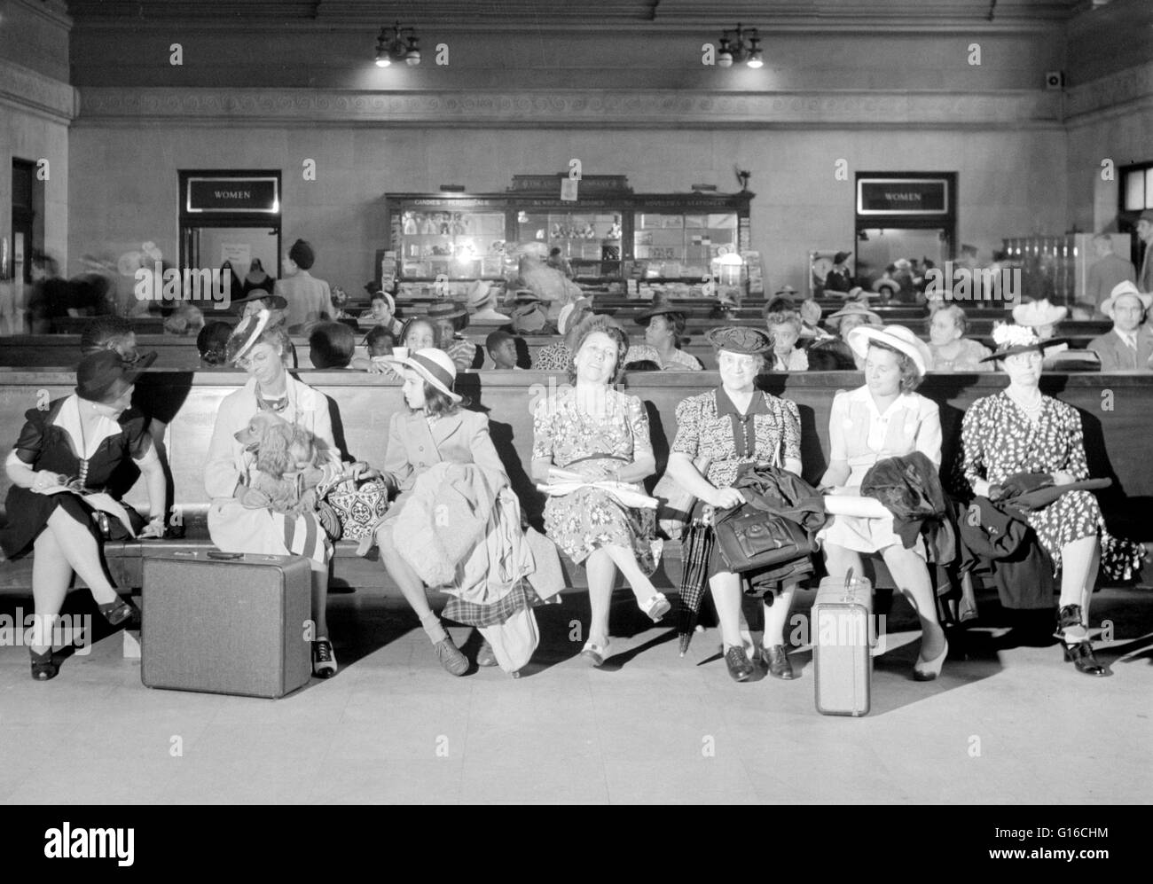 Waiting room. Pennsylvania Station was a historic railroad station, named for the Pennsylvania Railroad, its builder and original tenant, and shared its name with several stations in other cities. It was designed by McKim, Mead, and White and completed in Stock Photo