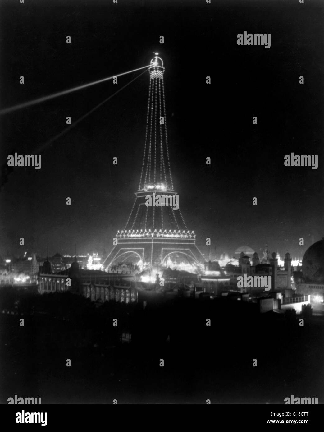 Eiffel Tower illuminated at Paris Exposition, 1900. The Exposition Universelle of 1900 was a world's fair held in Paris, France, to celebrate the achievements of the past century and to accelerate development into the next. The Eiffel Tower (La Tour Eiffe Stock Photo