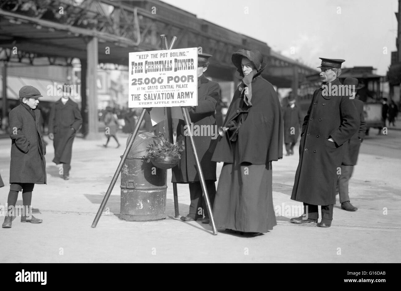 Entitled: 'Remember the poor : a Salvation Army Christmas box.' In 1901, kettle contributions in New York City provided funds for the first mammoth sit-down dinner in Madison Square Garden, a custom that continued for many years. Today in the U.S., The Sa Stock Photo