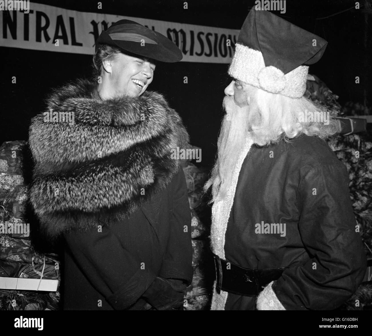 Entitled: 'Santa Claus and Mrs. Roosevelt at Central Union Mission's Christmas Party.' Anna Eleanor Roosevelt (October 11, 1884 - November 7, 1962) was an American politician. She was the longest serving First Lady of the United States, holding the post f Stock Photo