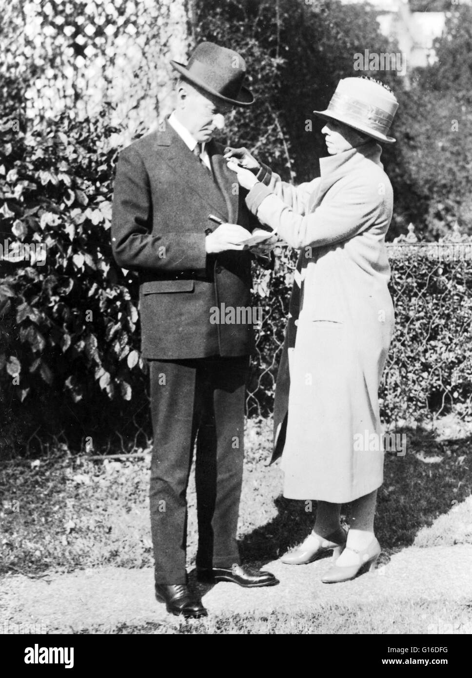 Mrs. Calvin Coolidge enrolls the President in the American Red Cross, October 29, 1924. John Calvin Coolidge, Jr. (July 4, 1872 - January 5, 1933) was the 30th President of the United States (1923-1929). A Republican lawyer from Vermont, Coolidge worked h Stock Photo