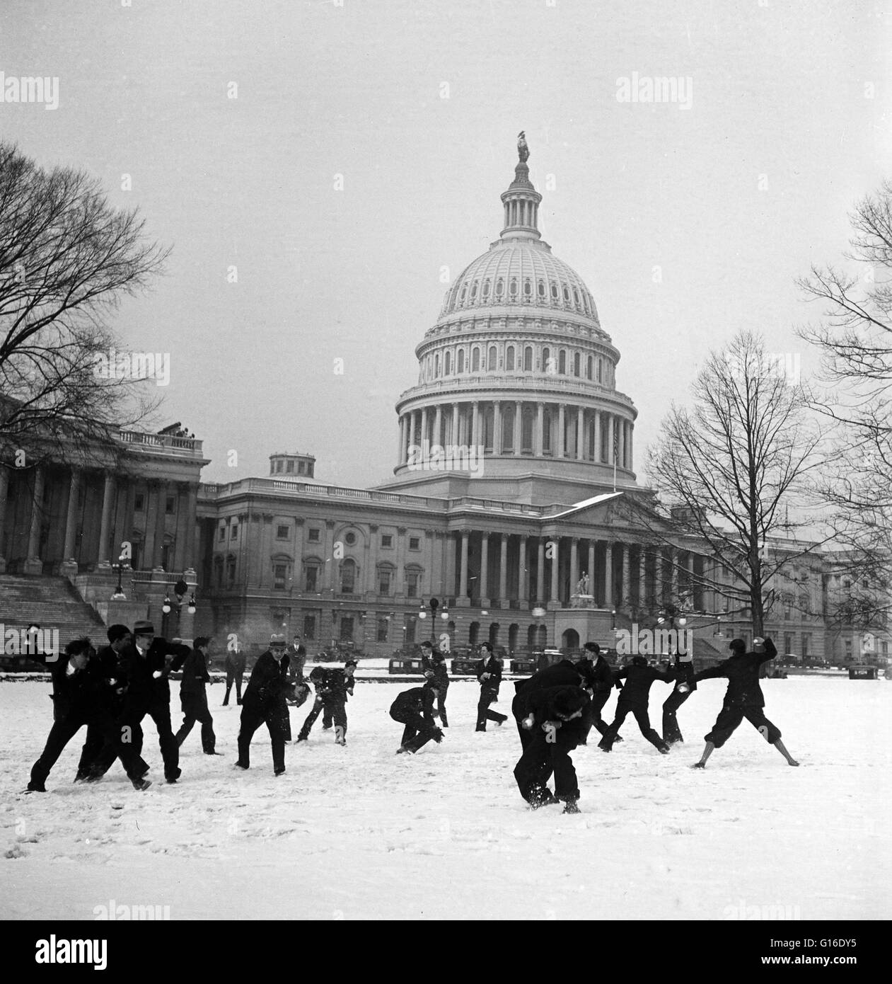 Entitled: 'Snowball fight in front of U.S. Capitol, Washington, D.C.' A United States Senate Page is a non-partisan federal employee serving the United States Senate in Washington, DC. Despite the non-partisan affiliation, pages are typically divided to s Stock Photo