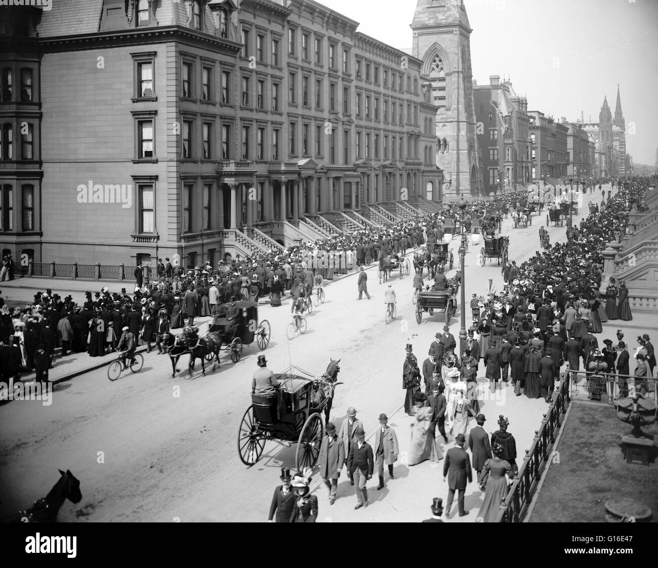 Entitled: 'Fifth Avenue on Easter morning.' The Easter parade is an American cultural event consisting of a festive strolling procession on Easter Sunday. Typically, it is a somewhat informal and unorganized event, with or without religious significance. Stock Photo