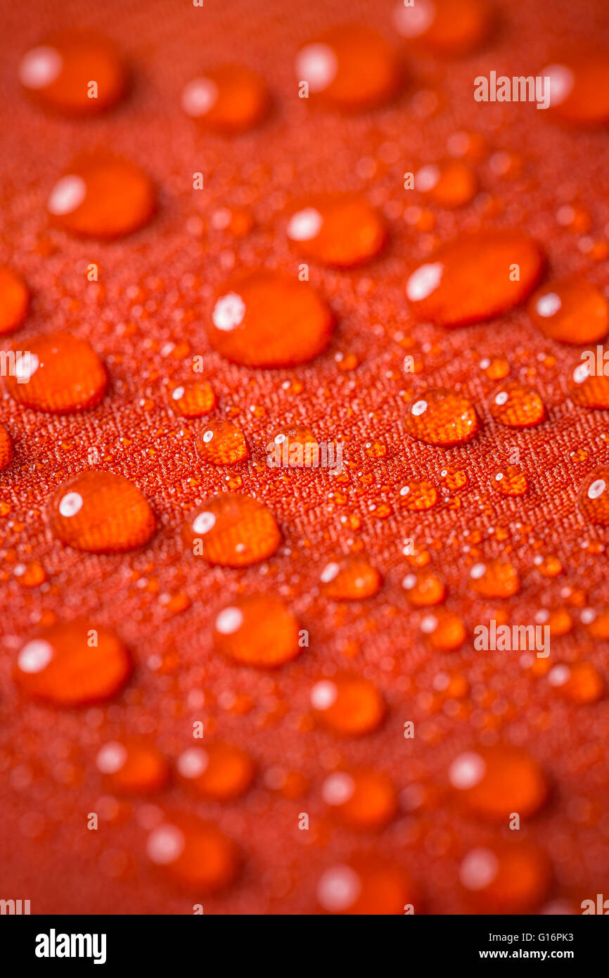 Waterproof textile background with water drops Stock Photo