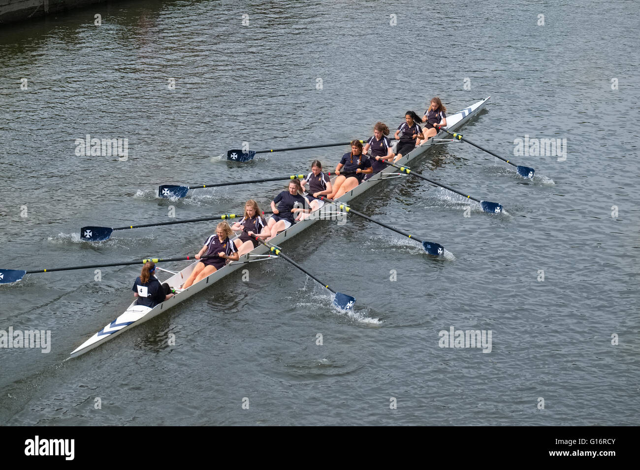 A female rowing team competing at Shrewsbury Regatta on the River