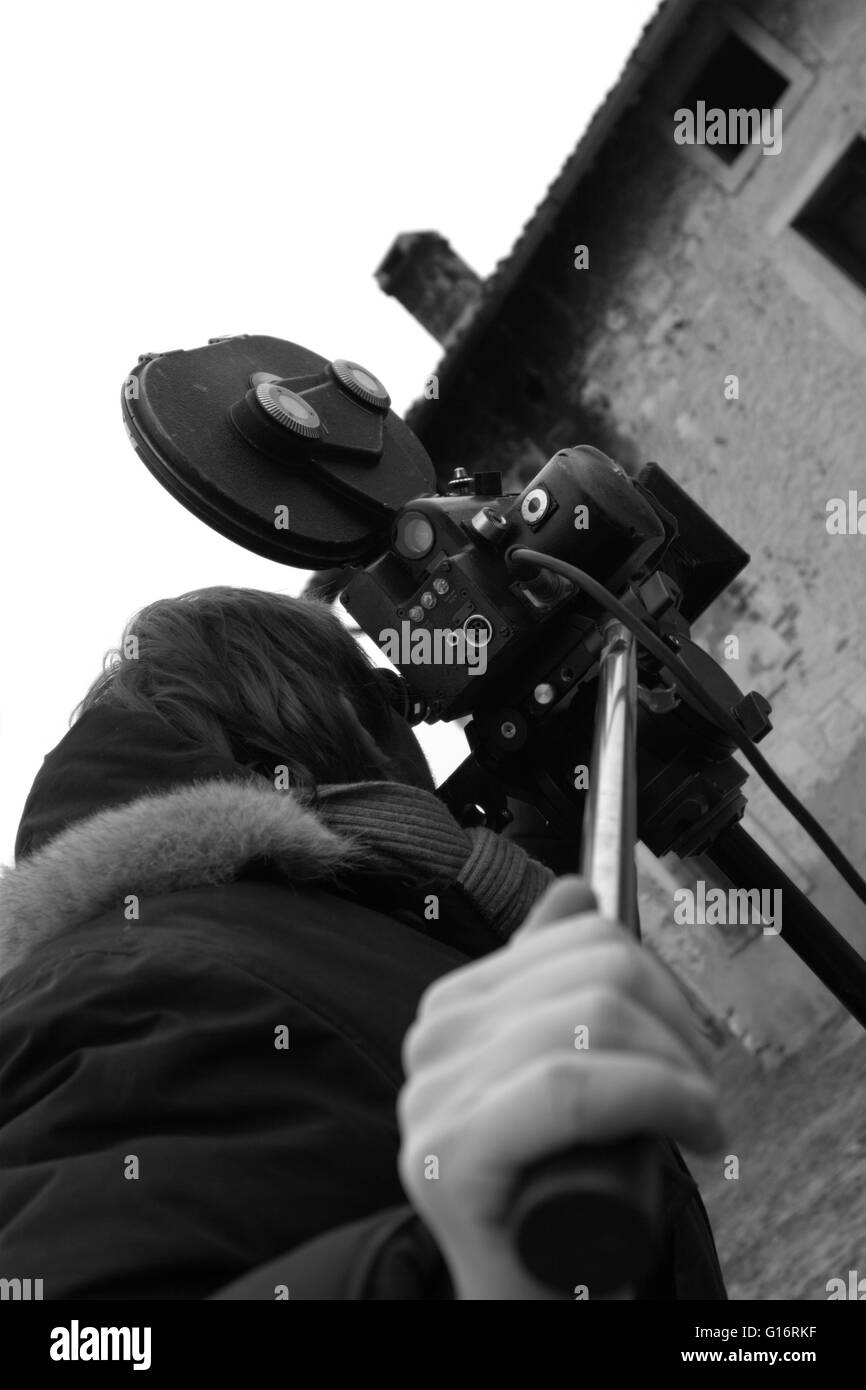 Old movie camera filming Black and White Stock Photos & Images - Alamy
