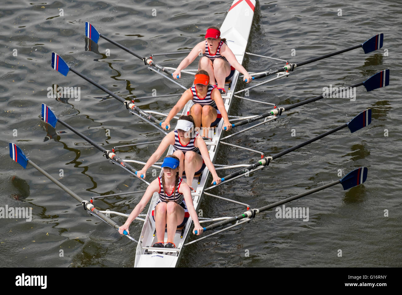 A female rowing team competing at Shrewsbury Regatta on the River