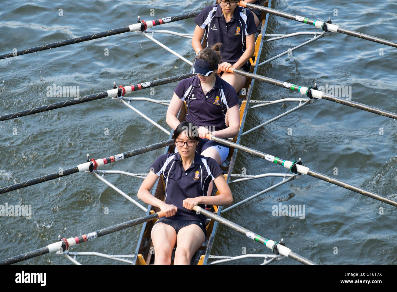 A female rowing team competing at Shrewsbury Regatta on the River