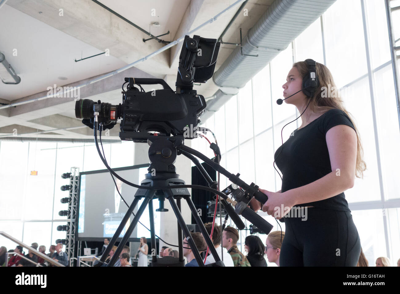 female video camera operator Stock Photo