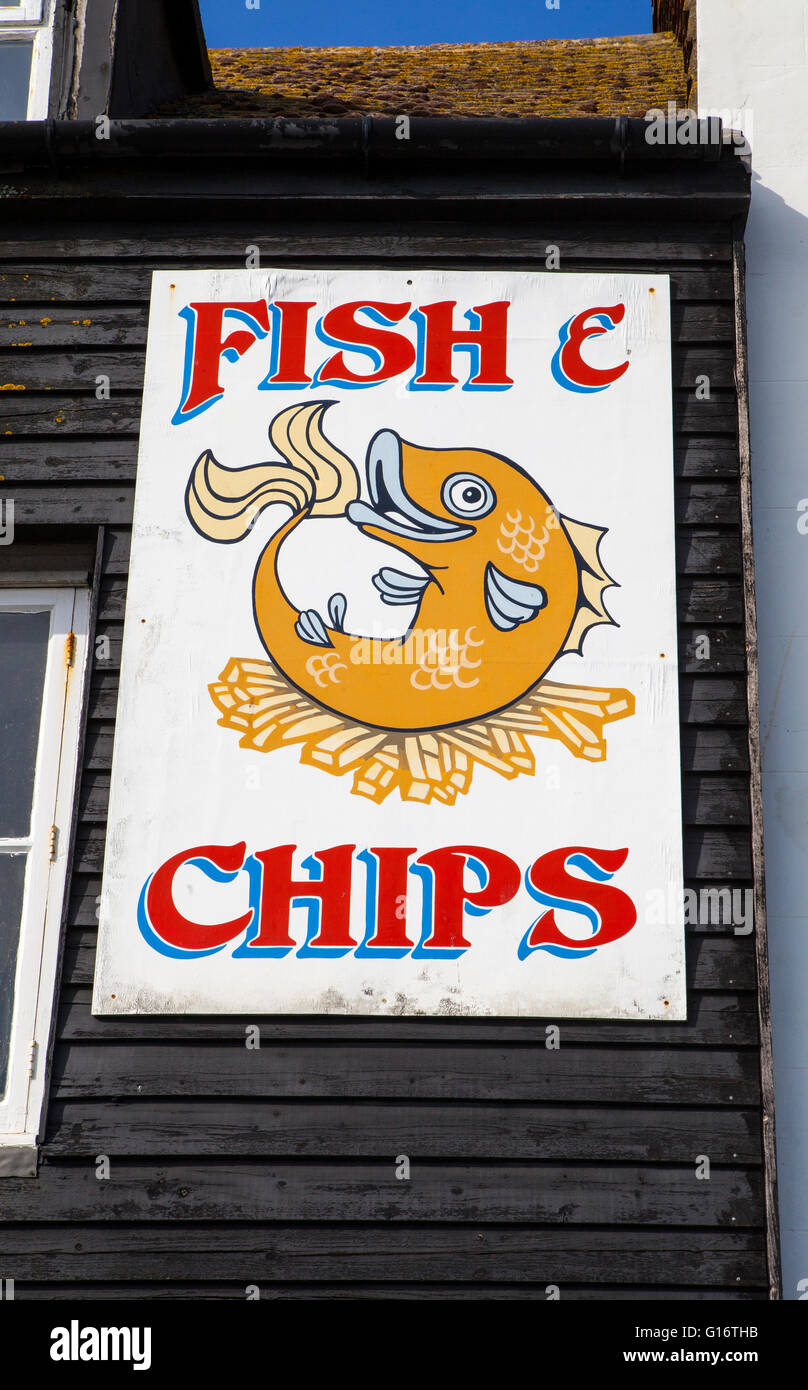 A sign above an eatery selling one of the traditional British dishes of Fish and Chips. Stock Photo