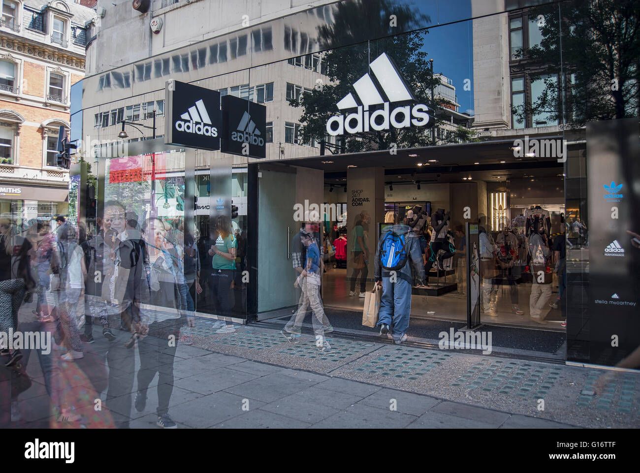 Blurred shoppers in London's Oxford Street by the Adidas store Stock Photo  - Alamy