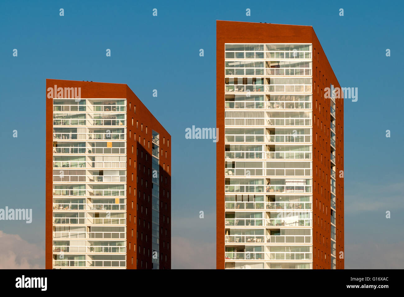 Detail of the top of two residential skyscrapers on Katendrecht peninsula in the city of Rotterdam, the Netherlands Stock Photo