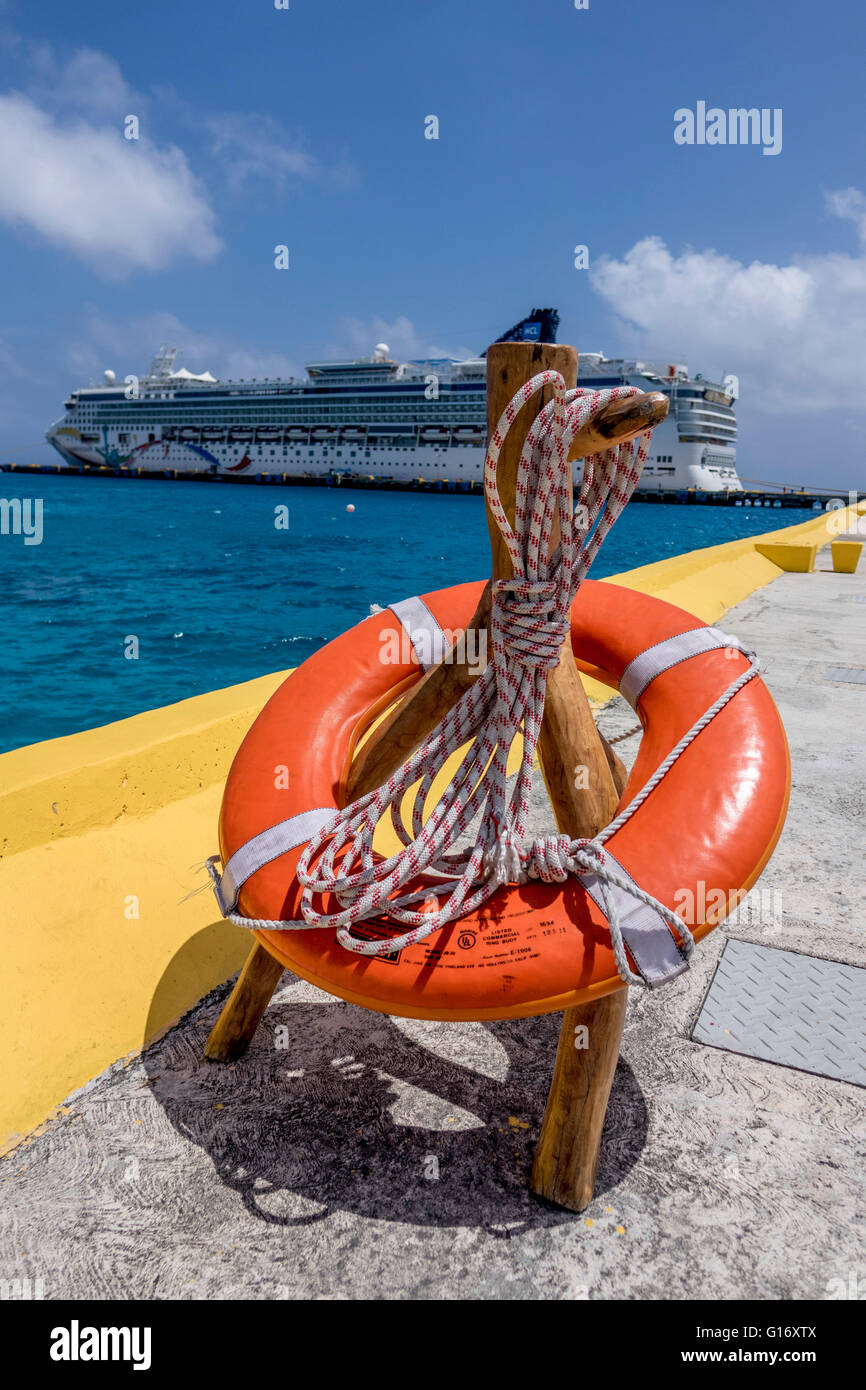 A Life Ring On The Quayside Dock Of Costa Maya Cruise Ship Port, Quintana Roo, Mexico Norwegian Dawn Ship In Port Stock Photo