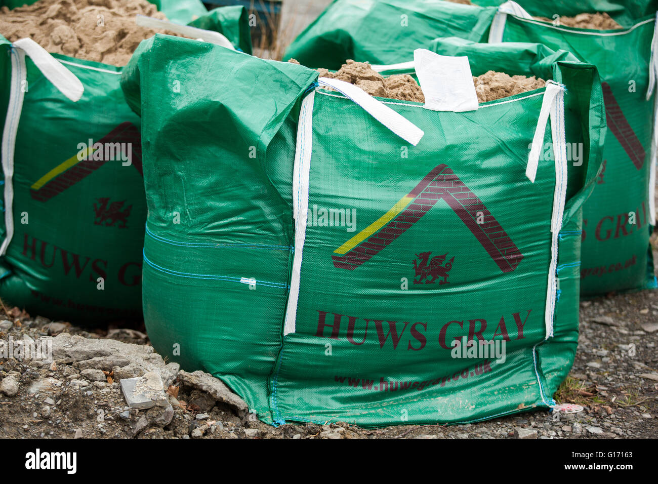 3 bags of Huws Gray builders merchant sand Stock Photo