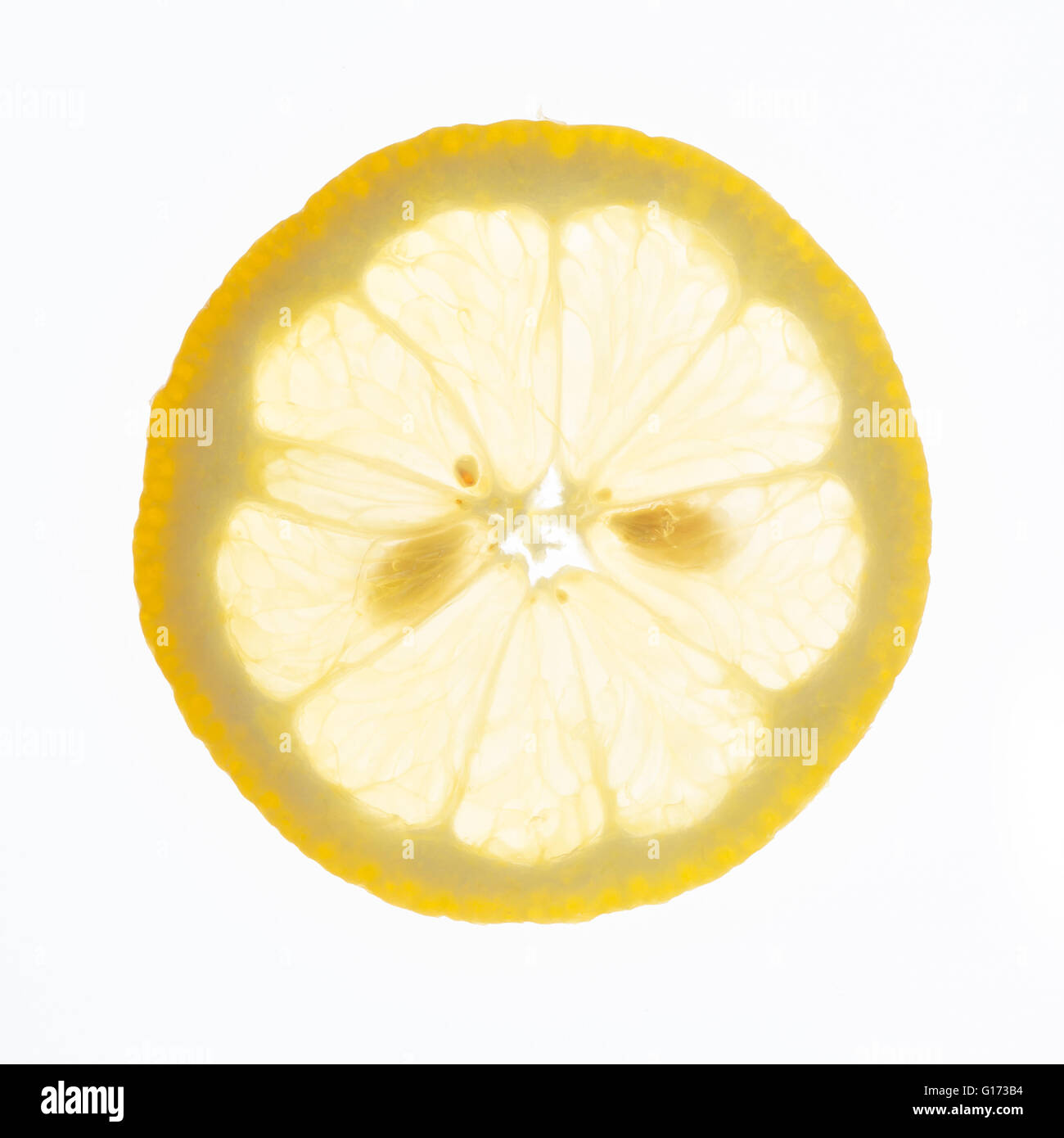 Slice of fresh lemon isolated on white background Stock Photo - Alamy