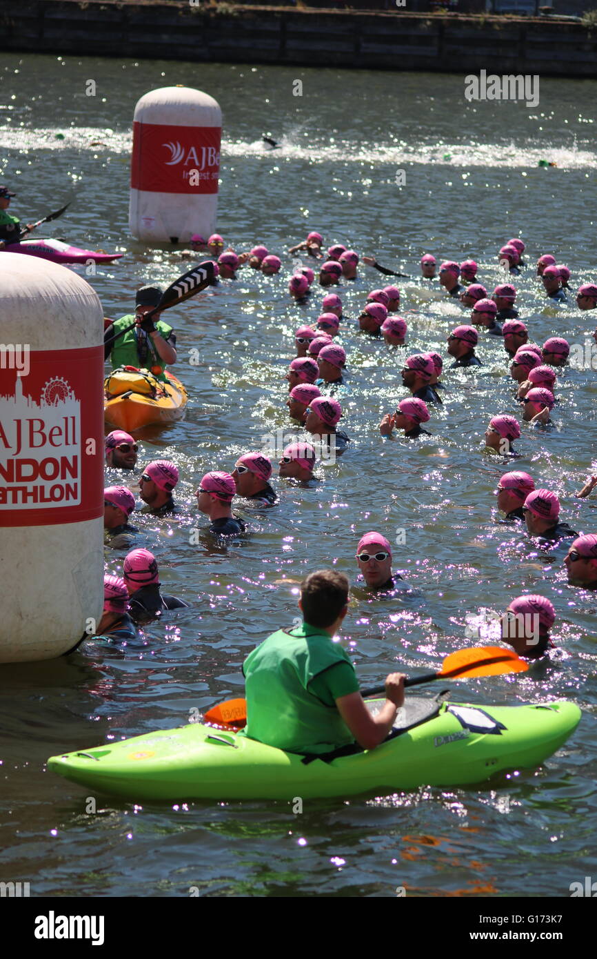 Competitors line up for the start of a swim heat at the London