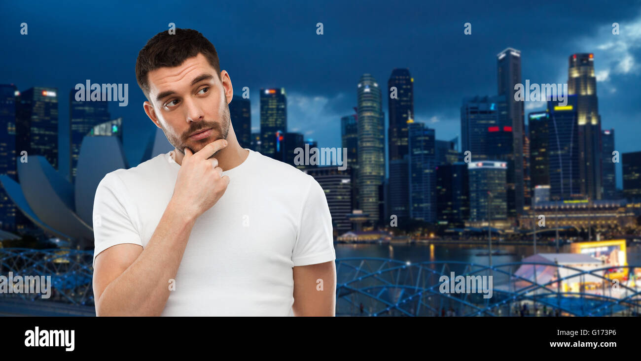 man thinking over gray background Stock Photo - Alamy