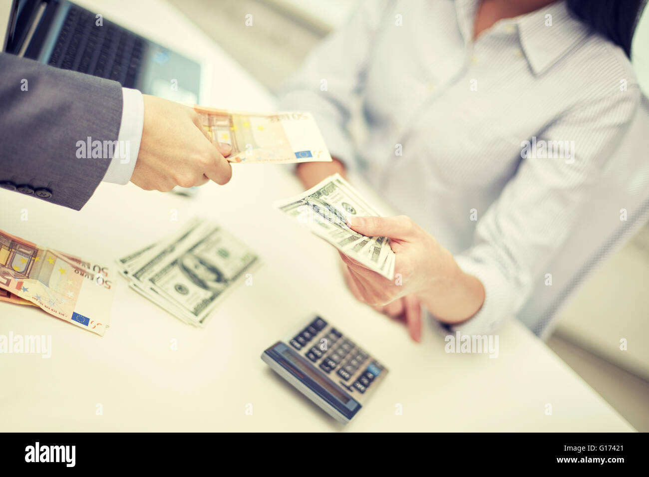 close up of hands giving or exchanging money Stock Photo