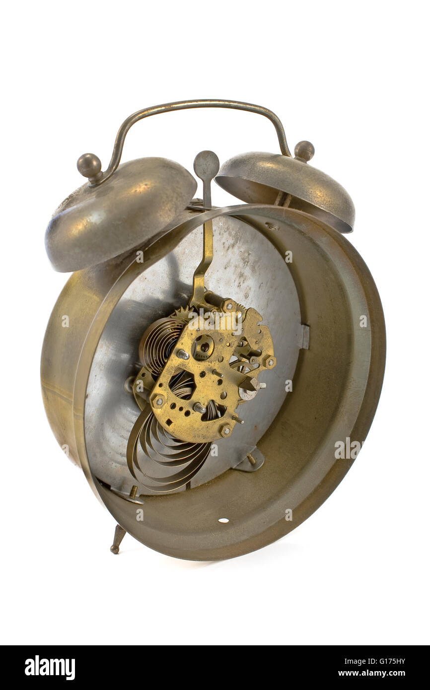 Inside mechanism of old alarm clock isolated on white Stock Photo Alamy