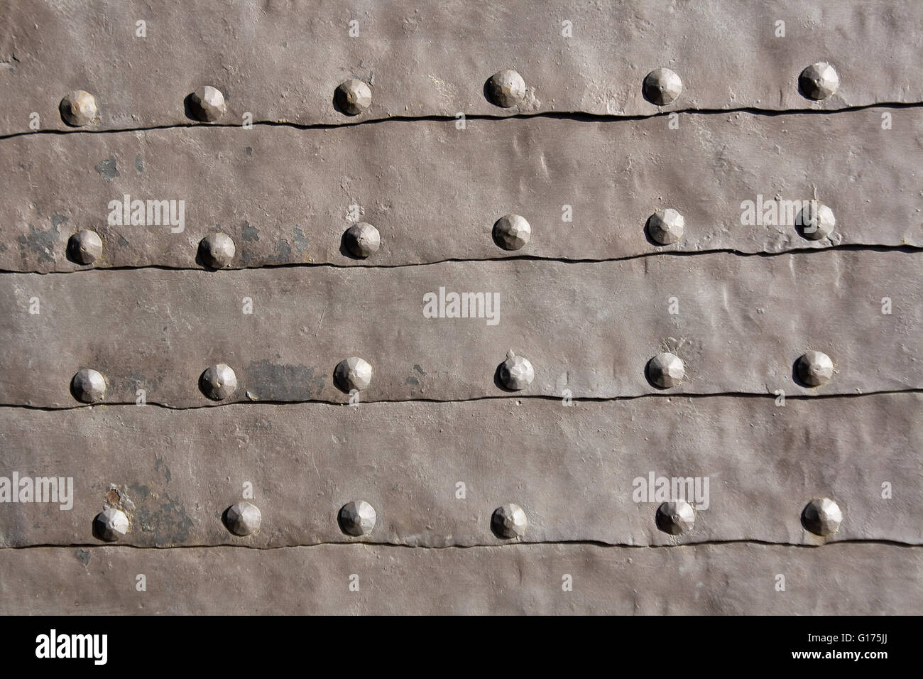 Medieval iron door as background Stock Photo - Alamy