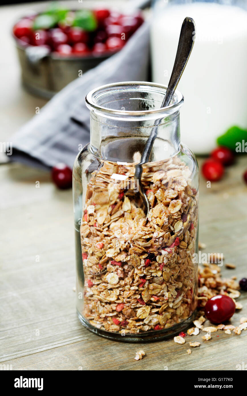 Close up of jar with granola or muesli on table - Healthy eating, Detox or Diet concept Stock Photo