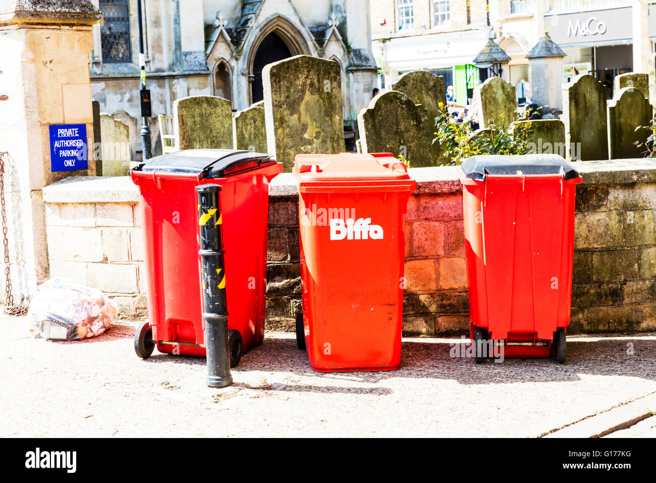 Biffa refuge collection bins wheelie bin for rubbish disposal collectors UK England English towns Stock Photo