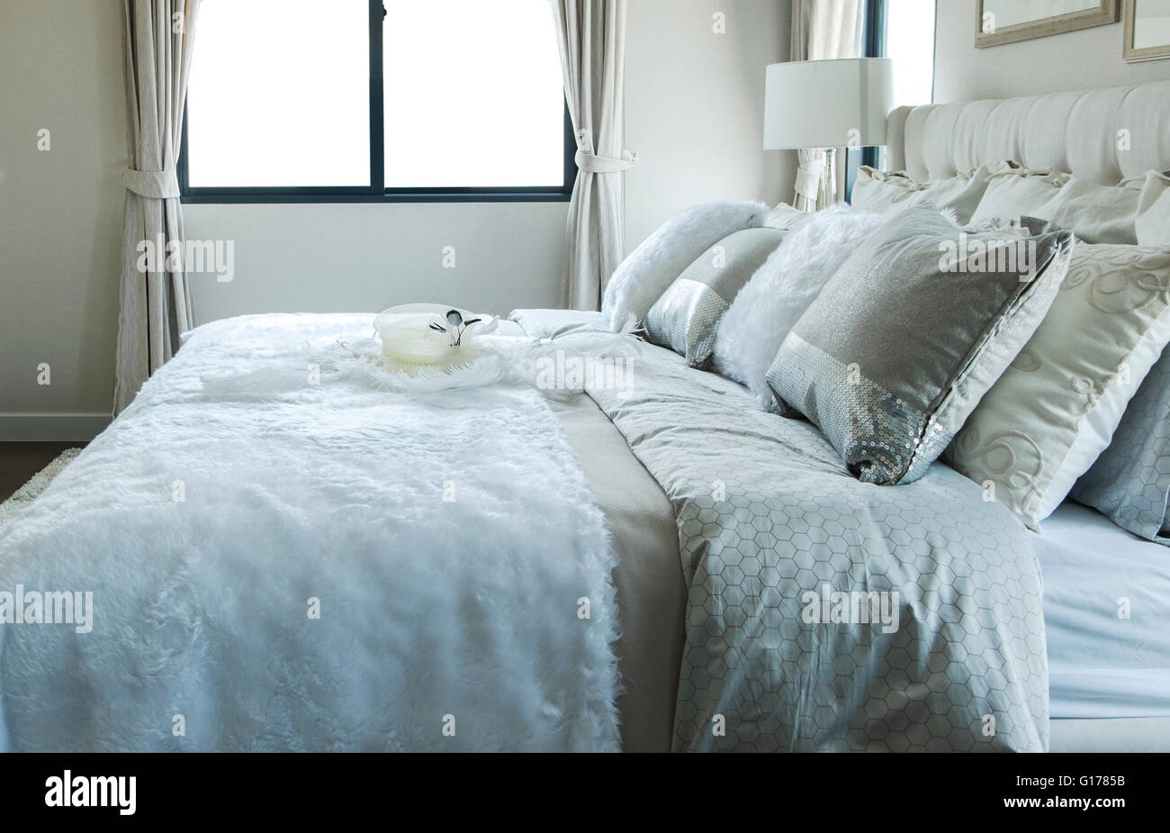 white and grey pillow on bed Stock Photo Alamy