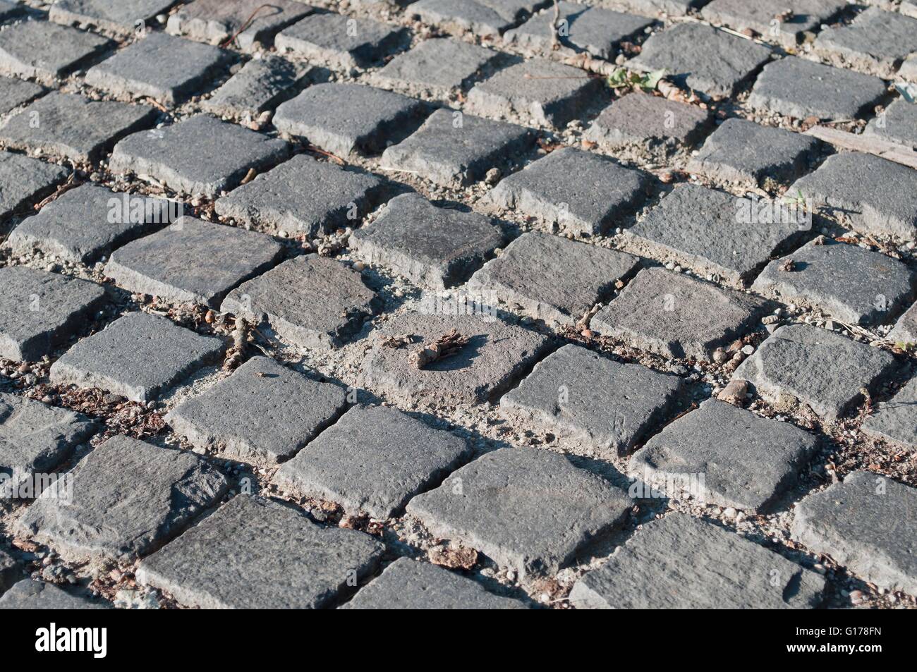 Background image of old cobblestone road Stock Photo - Alamy