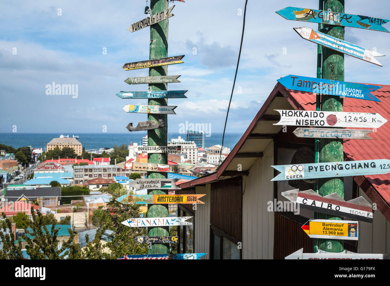Directional signs overlooking Punta Arenas, Chile, South America. Stock Photo