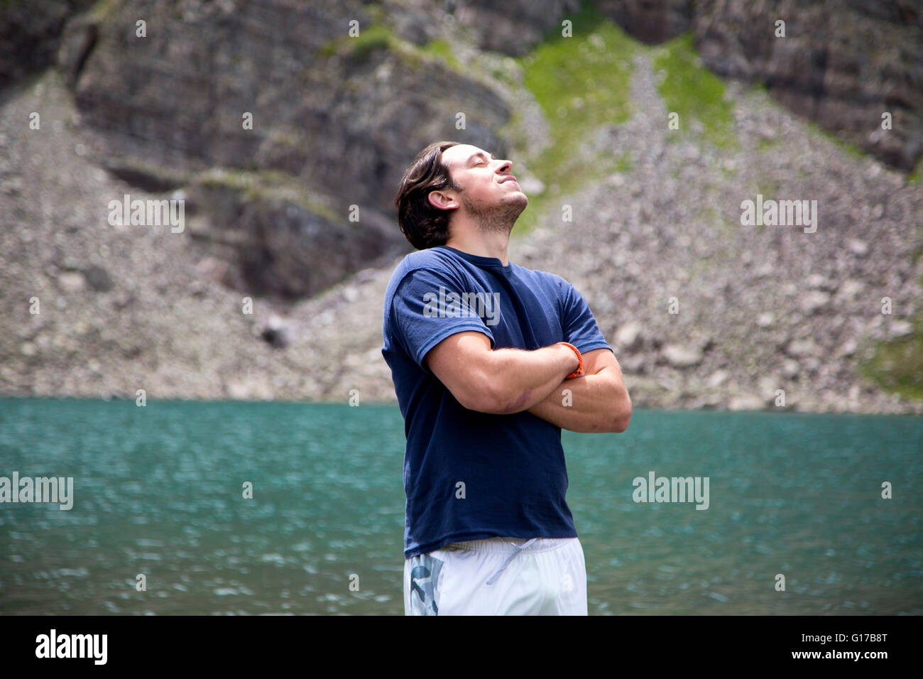 Man breathing in fresh air, Cathedral Lake, Aspen, Colorado Stock Photo