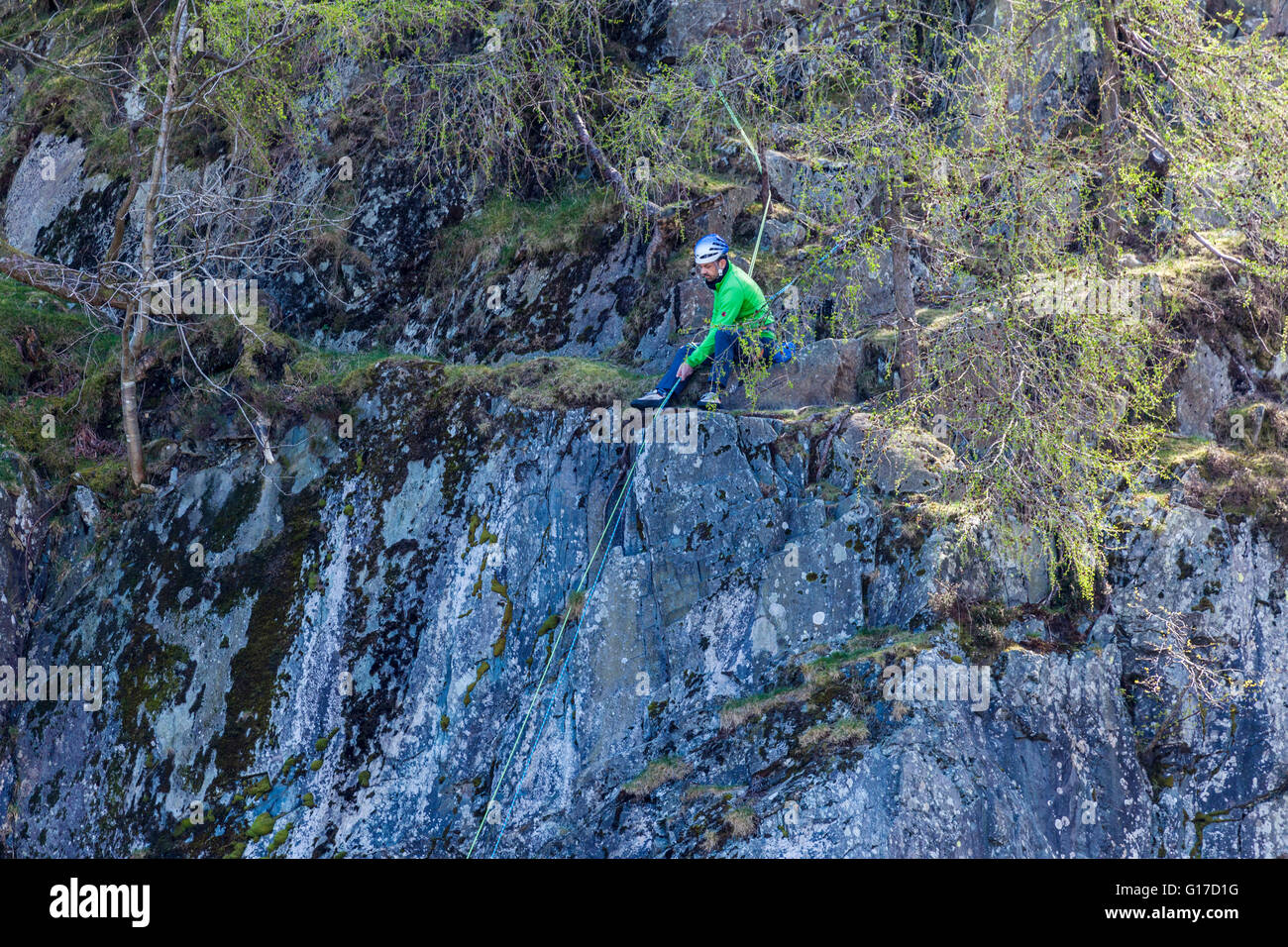 Rock Climber at Top of Climb Stock Photo Alamy