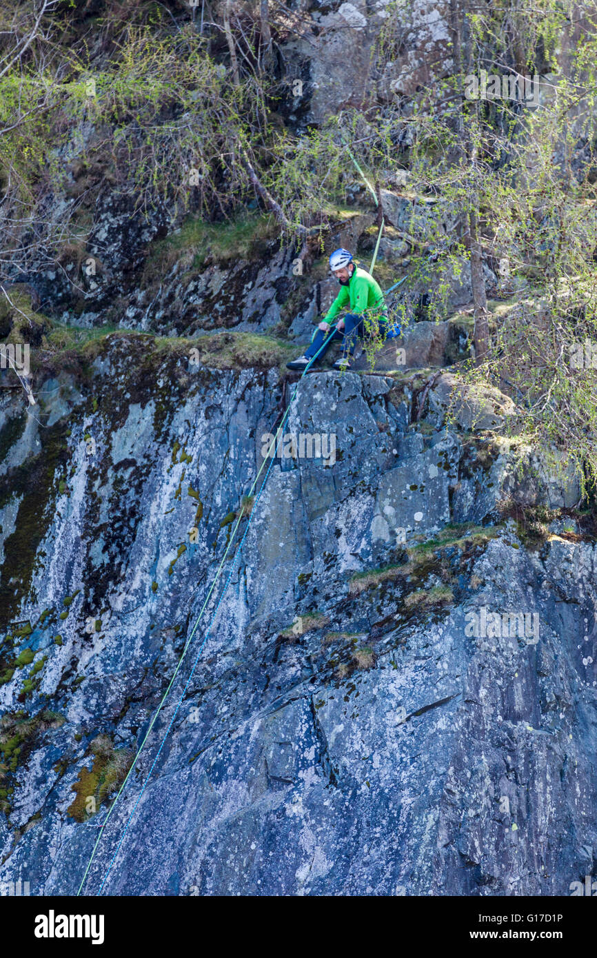 Rock Climber at Top of Climb Stock Photo Alamy