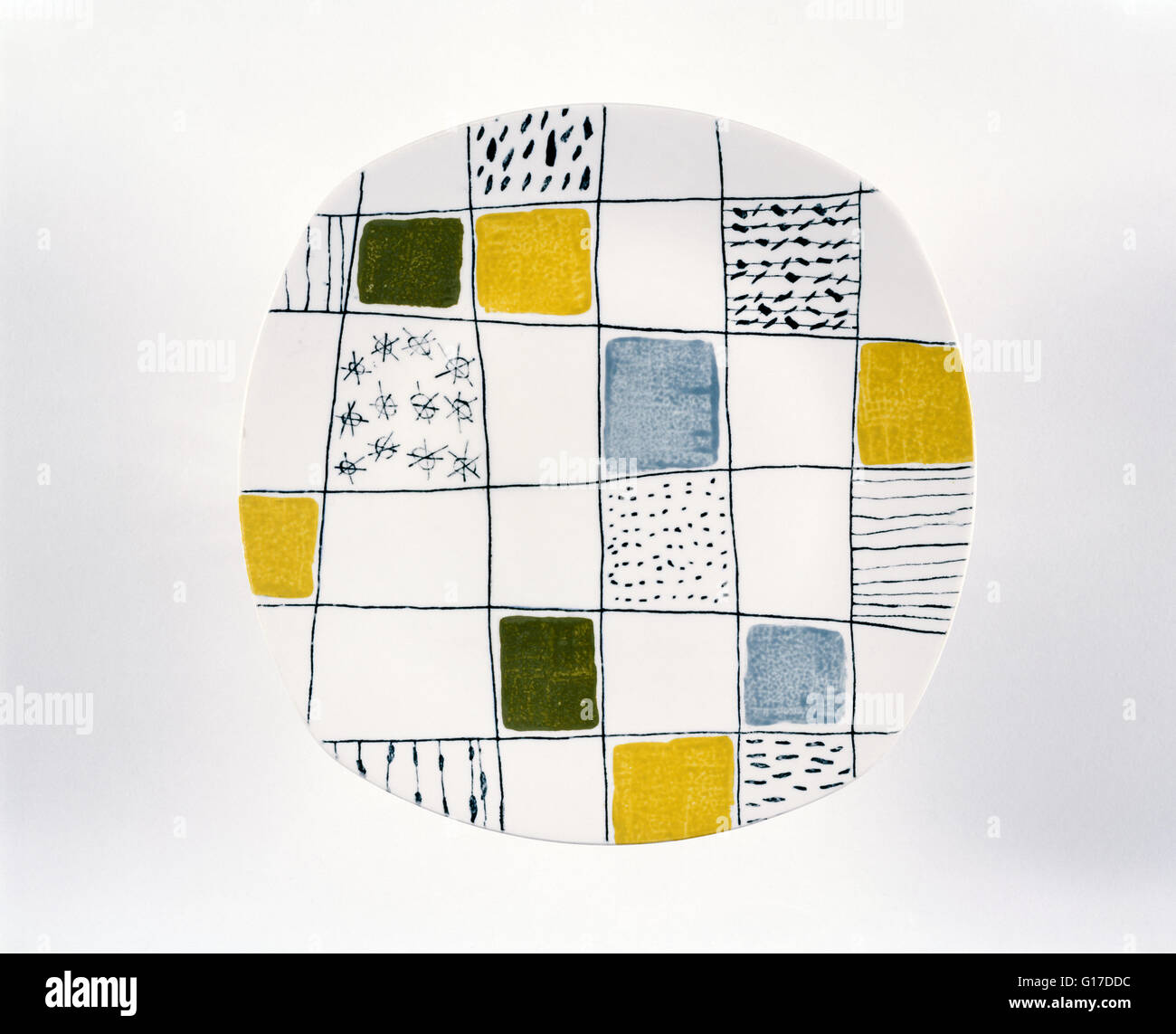 Glazed earthenware plate decorated with 'Chequer's' pattern designed by