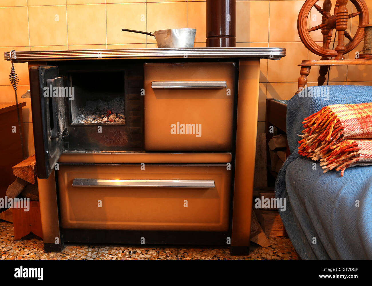 old woodburning stove in the kitchen Stock Photo Alamy