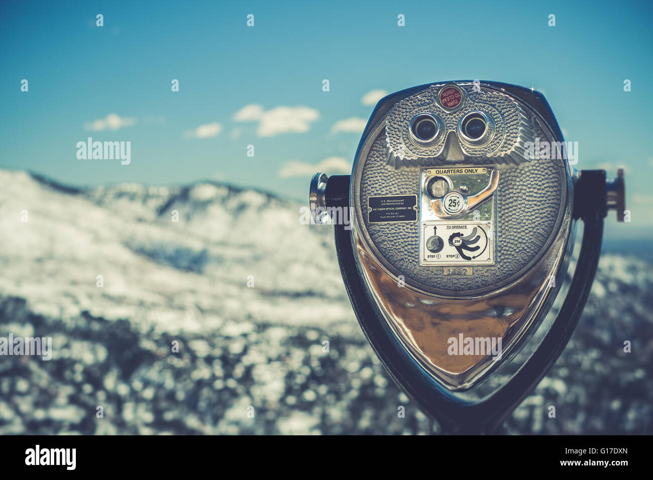Coin operated binoculars telescope on snowy Pike's Peak, Colorado, USA in winter Stock Photo