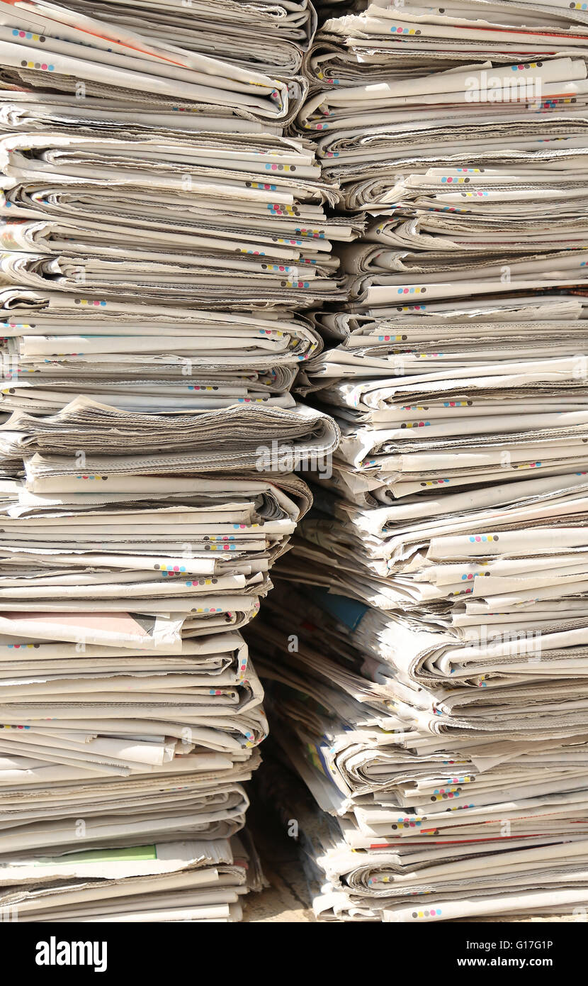 huge pile of many newspapers recyclable waste collection centre Stock Photo