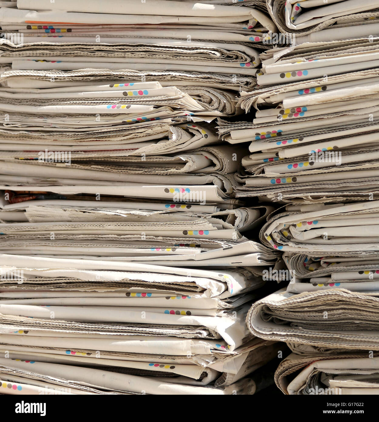 high pile of newspapers in EcoCentre to Paper recycling Stock Photo