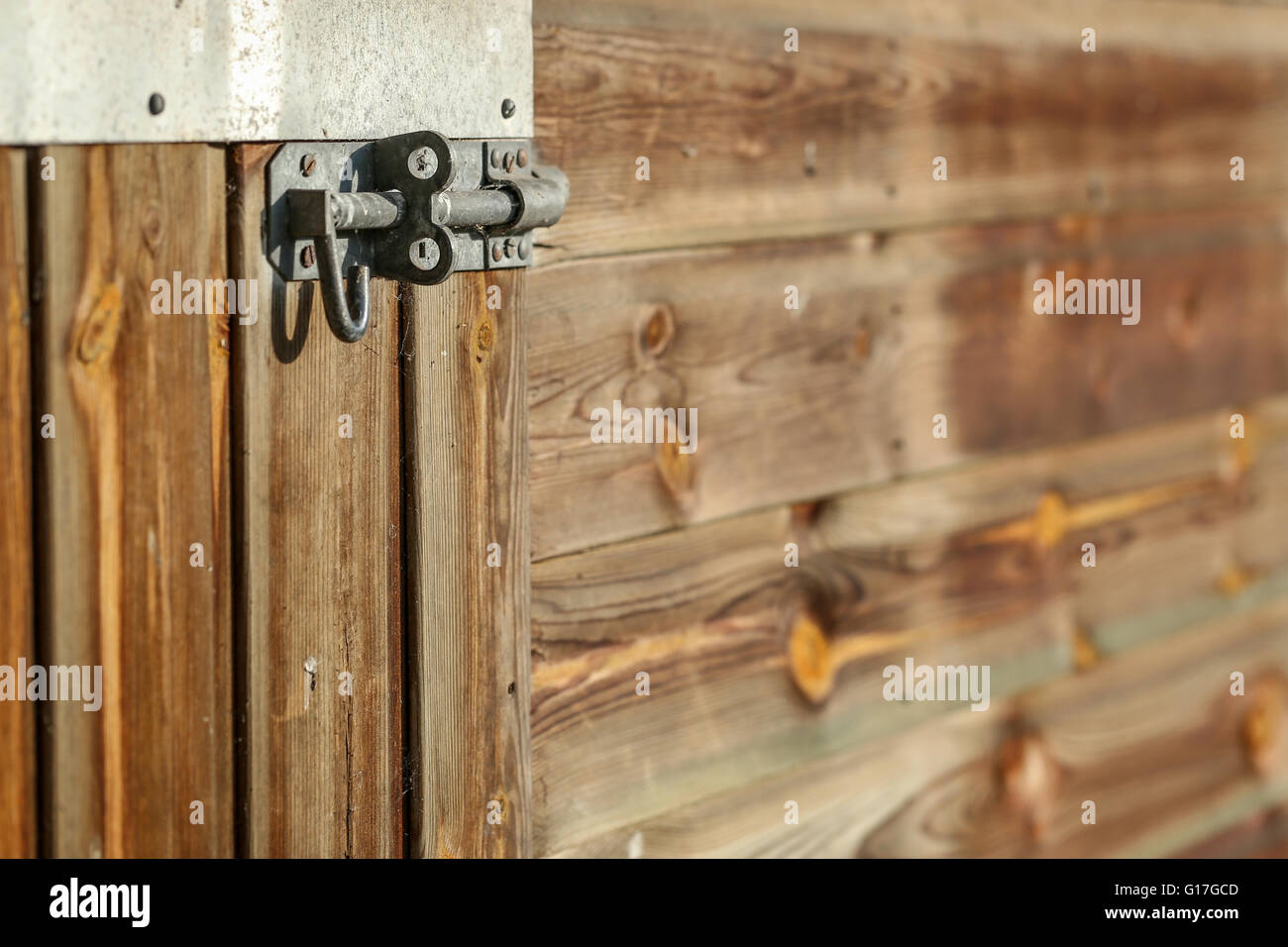 Wooden door with bolt Stock Photo - Alamy